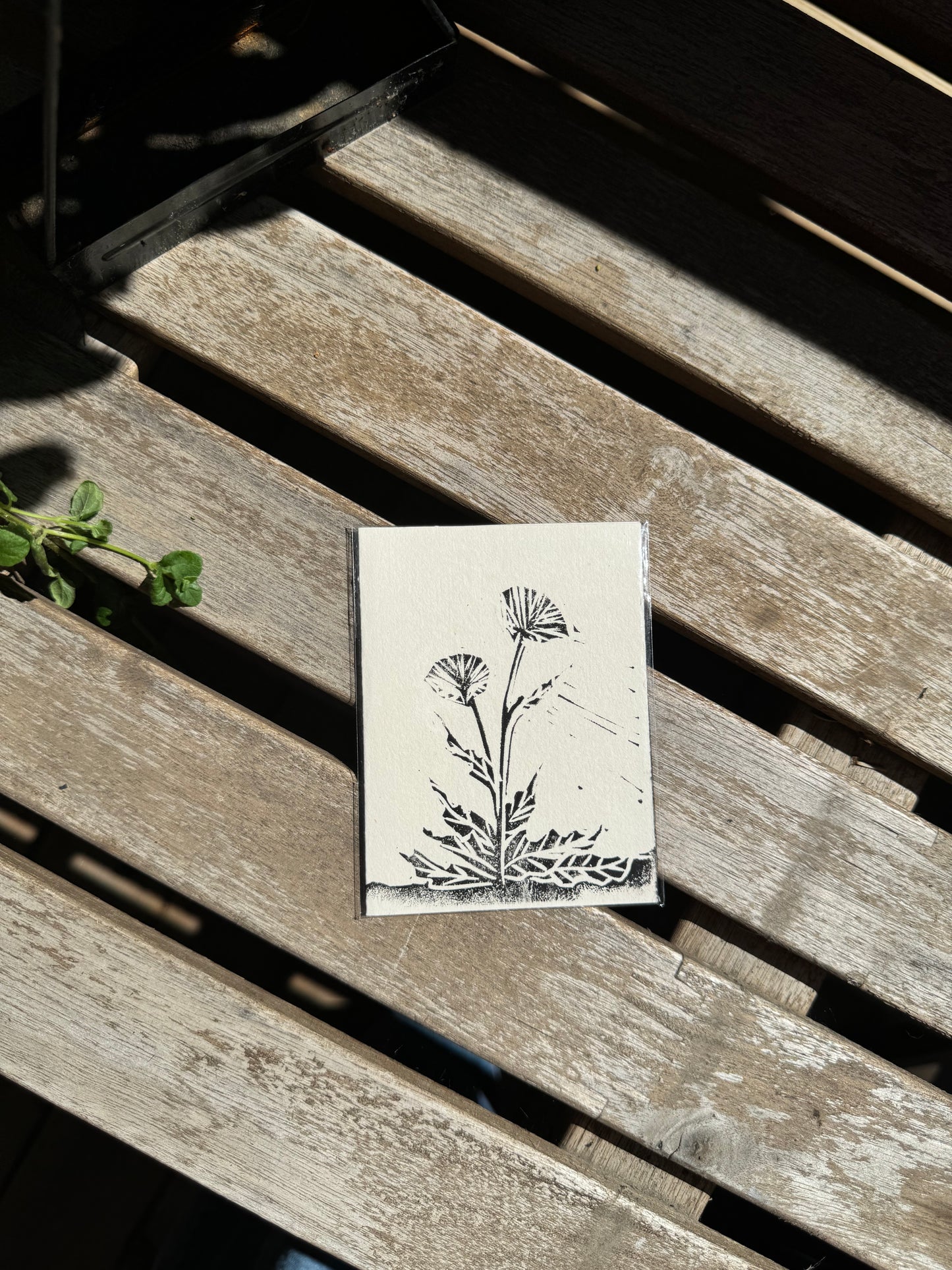 small handprinted dandelion card